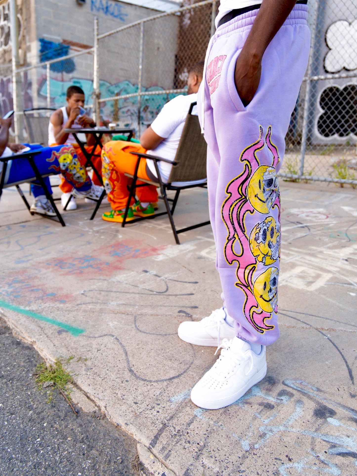 smiley face sweats purple